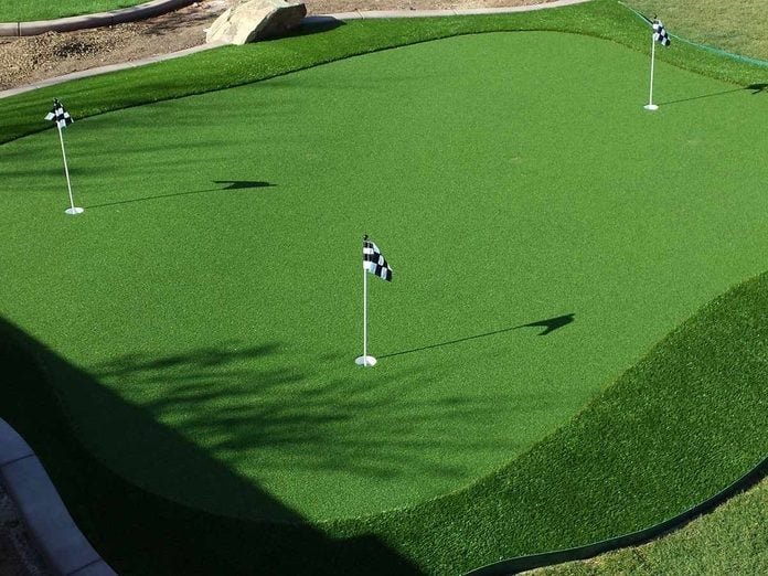 Artificial grass for golf mat